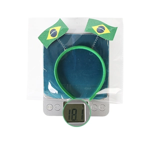 Detailed weight measurement of a Brazil flag spring headband in clear plastic packaging