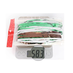Detailed weight measurement showing 58.3g for the football party fringe curtain