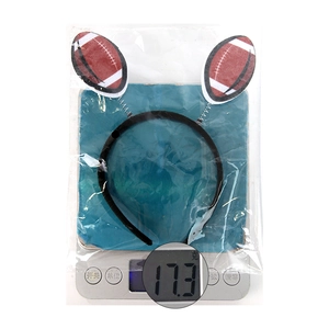 Weight display of 17.3g for a football party headband with spring-loaded balls