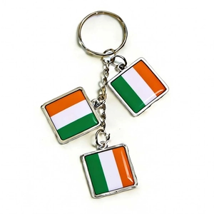 Detailed view of silver keychain featuring three square Irish flag enamel pendants