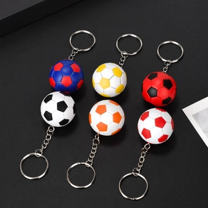 Miniature football keychains in six colors with realistic leather texture and metal rings