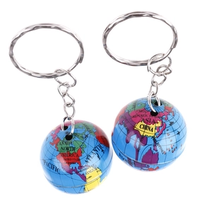 Detail showing two metal globe keychains with clear printed English world map on white background