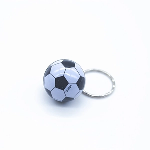 Miniature black and white soccer ball keychain with China print and silver metal ring