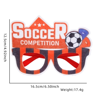 Detail of soccer competition party glasses with orange frame and felt fabric crown