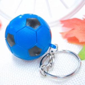 Mini blue and black football keychain with realistic stitching and silver metal ring