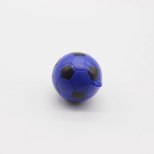 Close-up of blue and black mini soccer ball keychain with glossy plastic finish