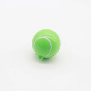 Close-up of a green tennis ball shaped container with a practical hanging ring