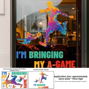 Close-up of rainbow soccer wall stickers with motivational text on glass surface