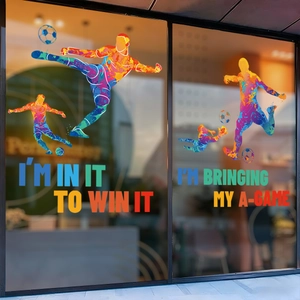 Vibrant window stickers with colorful soccer player silhouettes and motivational quotes