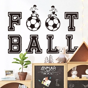Detail of football wall decals featuring FOOT BALL letters and players in a kids room