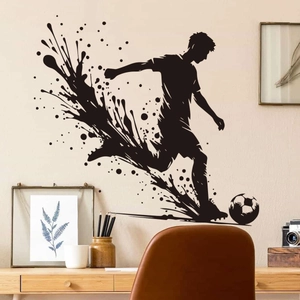 Dynamic soccer player silhouette wall sticker with ink splash effect on a room wall