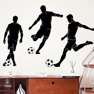 Detailed wall sticker showing black soccer player silhouettes on a clean white wall