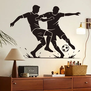 Soccer players silhouette wall sticker in a minimalist living room interior setting
