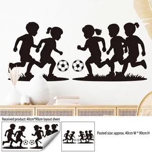 Black PVC soccer wall stickers showing silhouette of kids playing football in living room