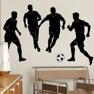 Detail of black football player silhouette wall stickers in a modern room setting