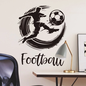 Detailed view of a black 3D football player silhouette wall sticker in a modern office