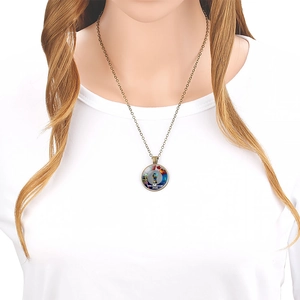 Close-up of 2026 World Cup mascot trophy pendant necklace with circular glass dome