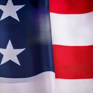 Close-up of the durable polyester fabric texture and stars on the American flag