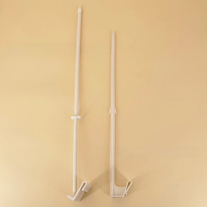 Close-up of durable white plastic car flag pole clips and mounting hooks set