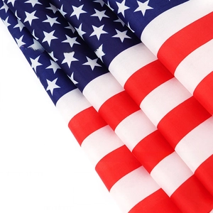 Detailed texture of polyester fabric on the American flag showing stars and stripes