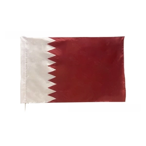 Detail of Qatar flag with nine-pointed serrated edge and durable polyester stitching