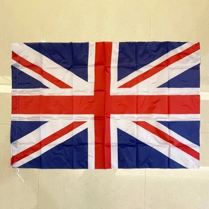 Detail of a 90x150cm polyester Union Jack British flag with durable white tie ropes