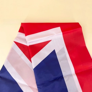 Detail of a 90x150cm UK Union Jack flag showing durable polyester fabric and stitching