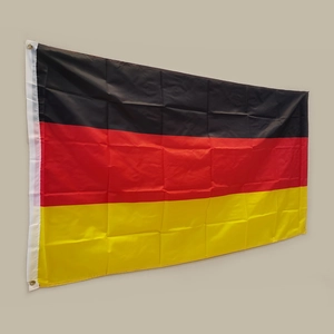 Detail of German flag with eagle emblem showing metal grommets and reinforced stitching