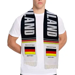 Knitted Germany flag fan scarf with white tassels and Deutschland lettering worn by model