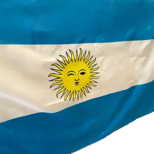 Detail of Argentina flag featuring blue-white stripes and the Sun of May on polyester