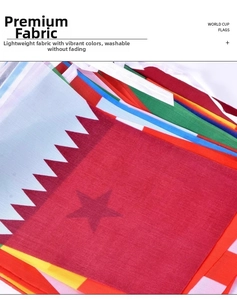 Detail of vibrant polyester World Cup national flags showing high quality fabric and print