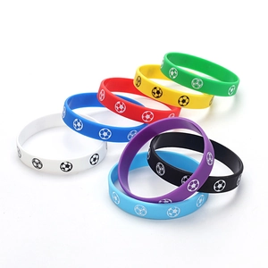 Colorful silicone soccer wristbands set for fans featuring football patterns on multi-colored bands