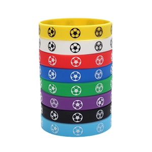 Set of eight colorful silicone football bracelets for sports fans in various vibrant tones