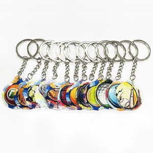 Lot de 11 porte-clés de sport en acrylique avec motifs colorés de foot, basket et tennis