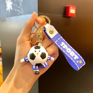 Cartoon soccer player keychain with blue jersey and Sport wristband strap