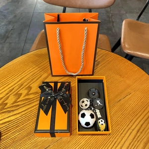 Soccer keychain gift set with 3D football, GOAL wristband in a premium orange gift box