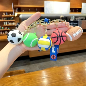 Five-piece sports ball keychain set including soccer, basketball, and tennis with wrist straps