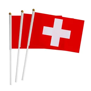 Polyester Switzerland hand flags with white poles and gold spear tops on white background