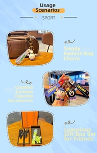 Cartoon sports keychain set with tennis, baseball charms and orange gift box packaging