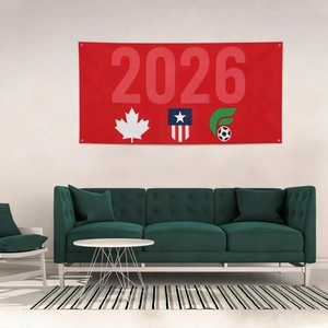 Red 2026 World Cup indoor wall banner with Canada USA and Mexico icons over a sofa