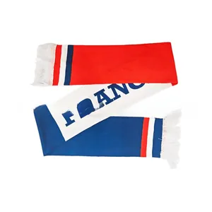 Detail of France football fan scarf with blue white red stripes and fringe decorations
