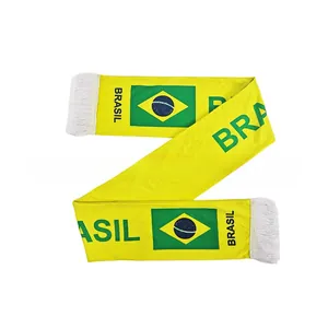 Detail of a yellow and green knitted Brazil football fan scarf with white fringe and logo