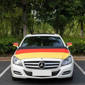 Front view of German flag themed elastic car hood cover and mirror socks on a white car