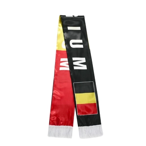 Detail of Belgium national flag scarf with vibrant black yellow red colors and white tassels