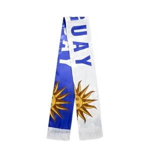 Detail of Uruguay football fan scarf with blue lettering and golden sun emblem
