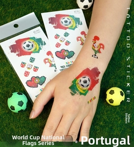 Detail of Portugal flag temporary tattoo set on green turf with football decor