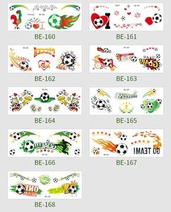 Macro detail of temporary soccer tattoo set featuring football and world flag motifs
