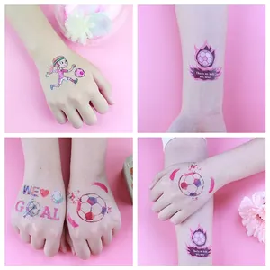 Temporary soccer tattoos for kids featuring cartoon players and colorful ball designs