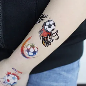 Waterproof children's soccer temporary tattoos with flame design on arm for fans