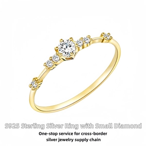Macro shot of S925 sterling silver infinity ring with gold plating and paved small diamonds
